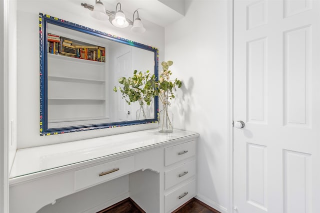 bathroom featuring vanity and hardwood / wood-style flooring