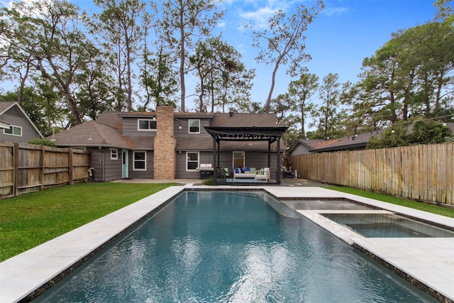 rear view of house featuring outdoor lounge area, a pool with hot tub, a pergola, and a lawn