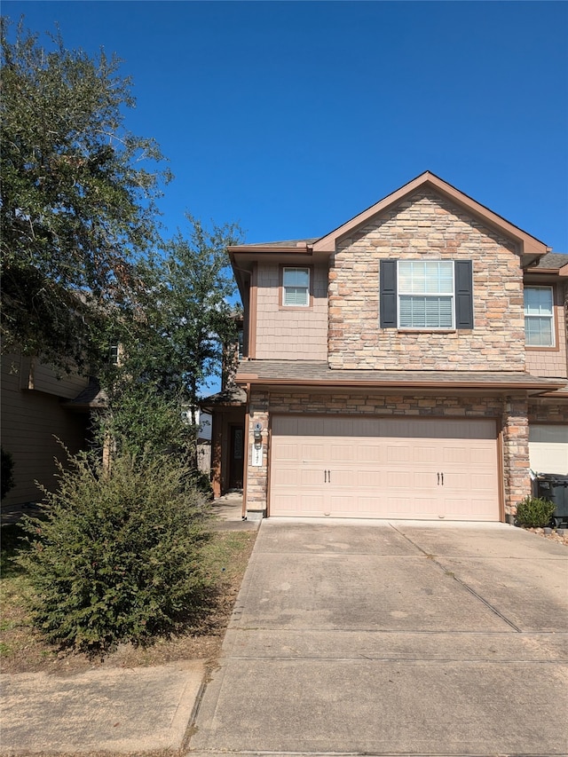 view of front of property featuring a garage