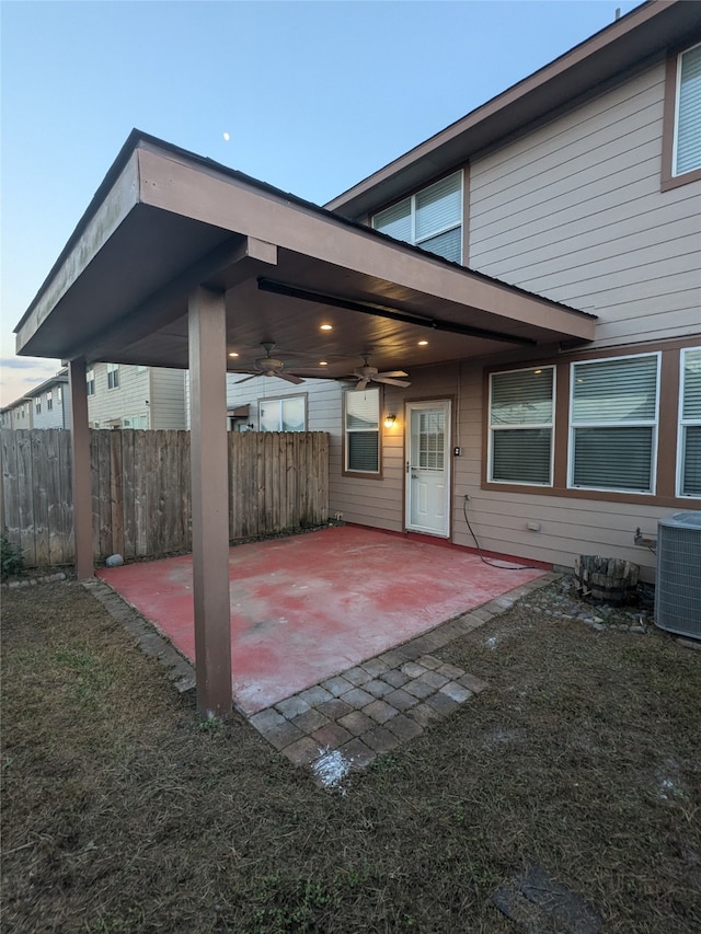 view of patio / terrace with central AC unit and ceiling fan