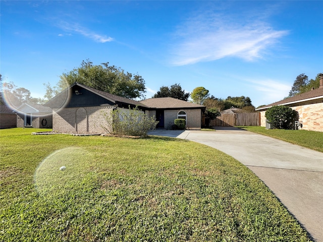 ranch-style house with a front lawn