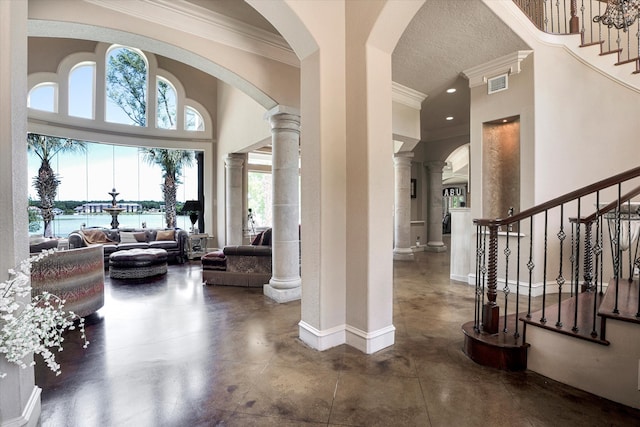 building lobby featuring a water view