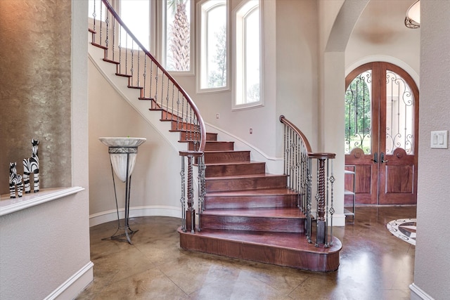 foyer entrance featuring a wealth of natural light and french doors