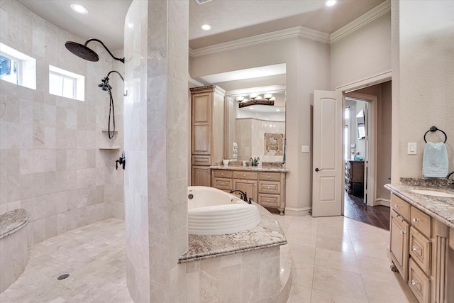 bathroom featuring hardwood / wood-style flooring, vanity, separate shower and tub, and crown molding