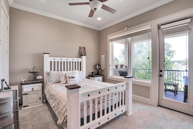 carpeted bedroom with ornamental molding, access to outside, and ceiling fan