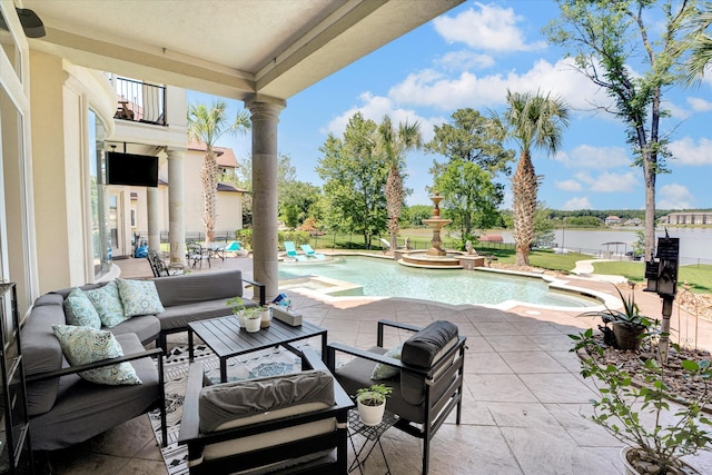 view of swimming pool featuring an outdoor hangout area and a patio area