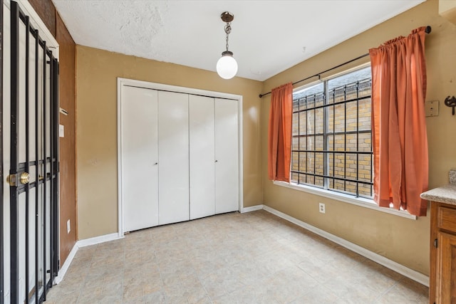 unfurnished bedroom with a closet