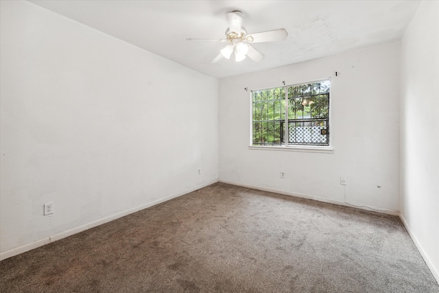 unfurnished room with carpet floors and ceiling fan