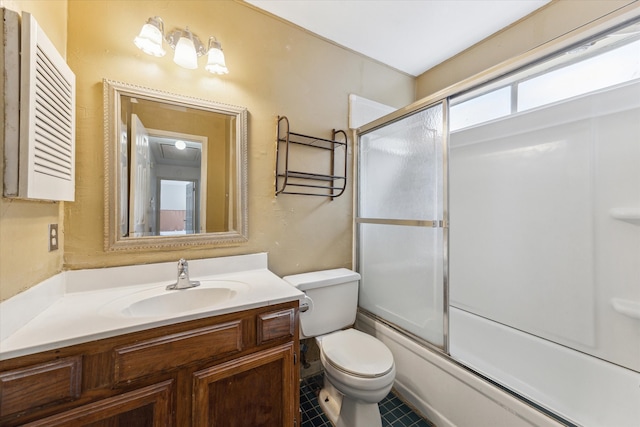 full bathroom with toilet, combined bath / shower with glass door, vanity, and tile patterned floors