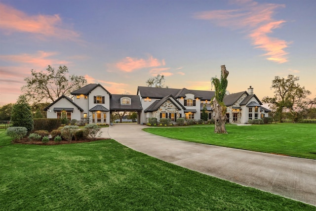 view of front of house with a lawn