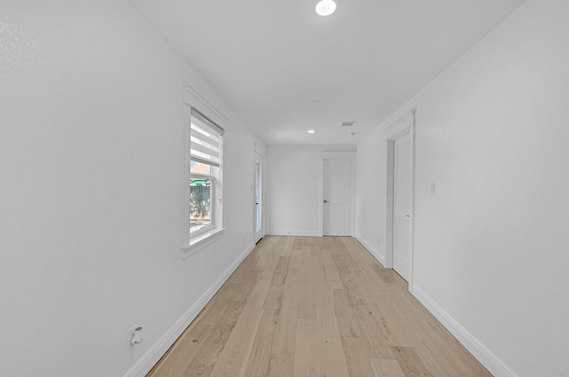 hallway featuring light hardwood / wood-style flooring