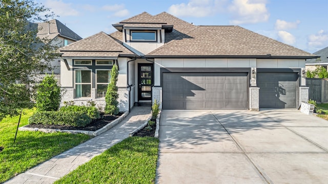 view of front of home with a garage