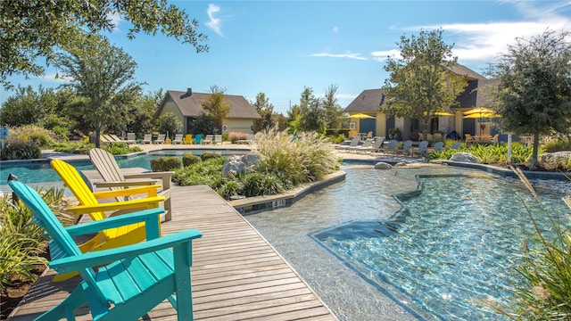 view of swimming pool with a patio area