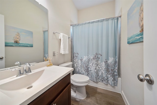 full bathroom with toilet, vanity, shower / tub combo, and hardwood / wood-style flooring