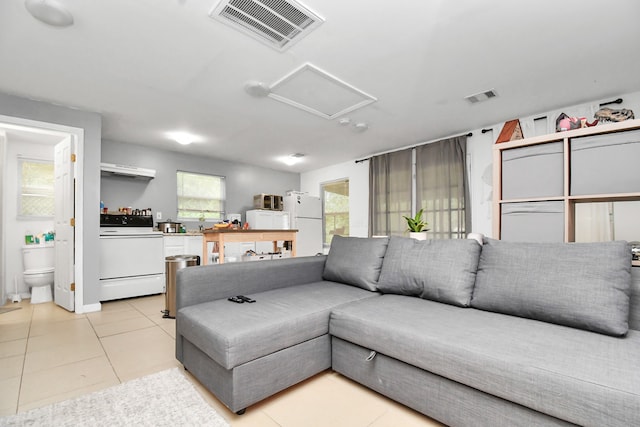 living room with light tile patterned floors