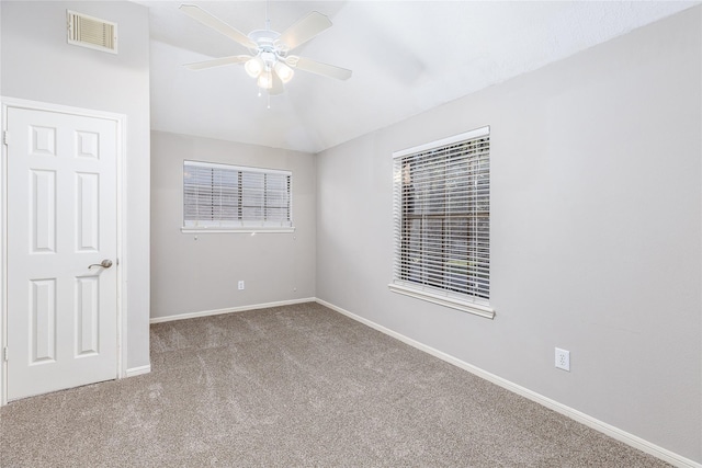 carpeted empty room with ceiling fan