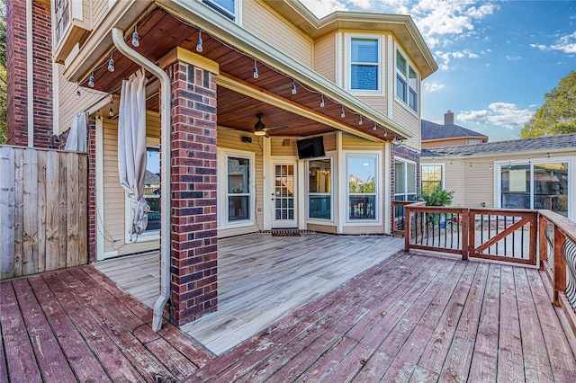 wooden deck with ceiling fan