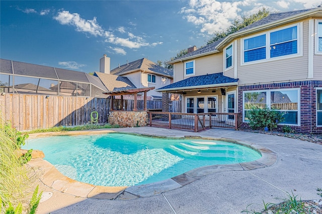 view of pool featuring a patio area and ceiling fan