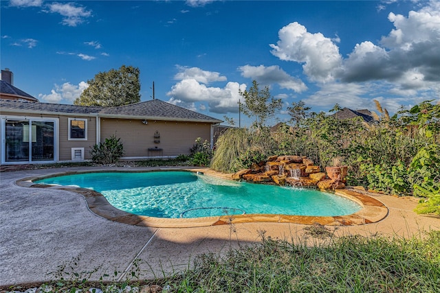 view of swimming pool featuring a patio area