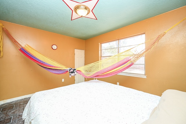 bedroom with a textured ceiling