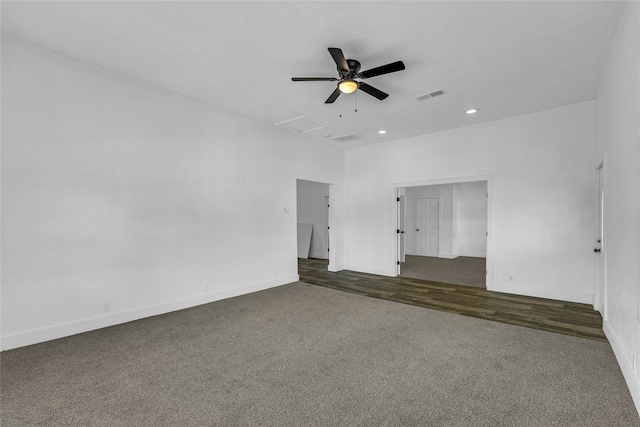 unfurnished room with ceiling fan and dark hardwood / wood-style floors