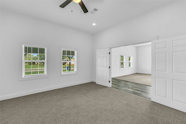 unfurnished bedroom featuring hardwood / wood-style floors and ceiling fan