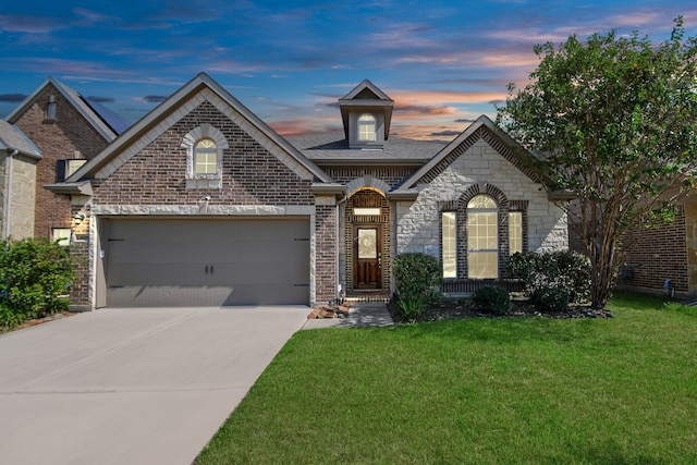 view of front of home with a yard