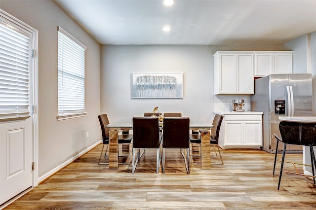 dining room featuring light wood-type flooring