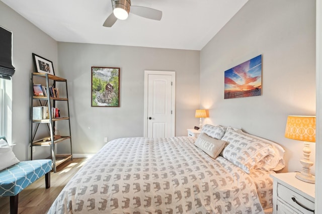 bedroom featuring ceiling fan and light hardwood / wood-style floors