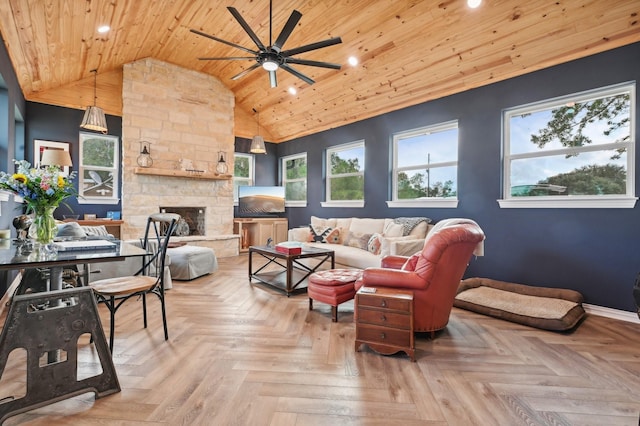 living room featuring light parquet floors, ceiling fan, a stone fireplace, and wood ceiling