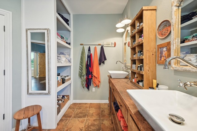 bathroom with vanity and built in features