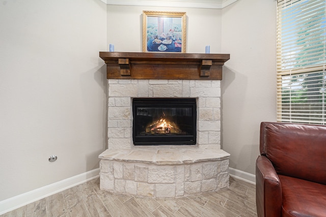 interior details with a fireplace and hardwood / wood-style floors