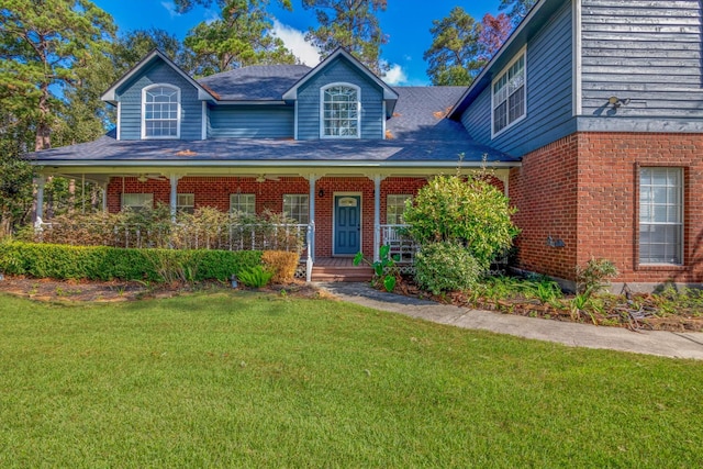 view of front of house featuring a porch and a front lawn