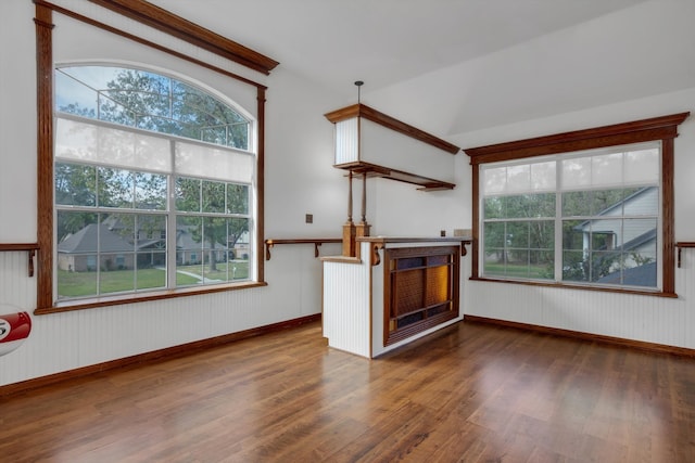 unfurnished living room featuring dark hardwood / wood-style floors