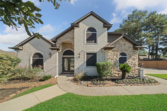 french country inspired facade with french doors