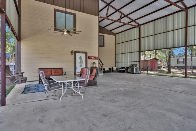 161 Cayman St, Point Blank, TX 77364 - garage featuring ceiling fan and a storage unit