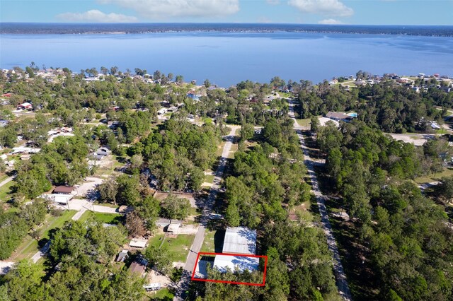 161 Cayman St, Point Blank, TX 77364 - aerial overview of property's location with property parcel outlined and a nearby body of water