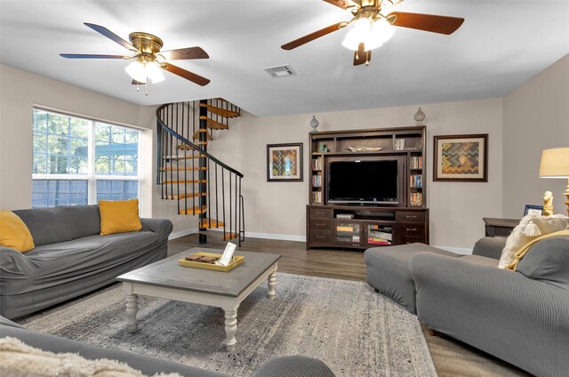 161 Cayman St, Point Blank, TX 77364 - living area featuring ceiling fan, wood finished floors, stairway, and baseboards
