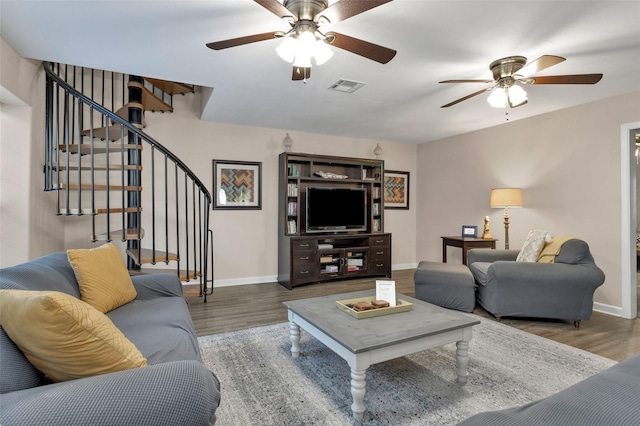 161 Cayman St, Point Blank, TX 77364 - living room with a ceiling fan, wood finished floors, stairs, and baseboards