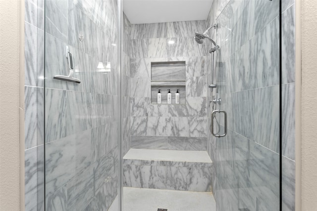 bathroom featuring an enclosed shower