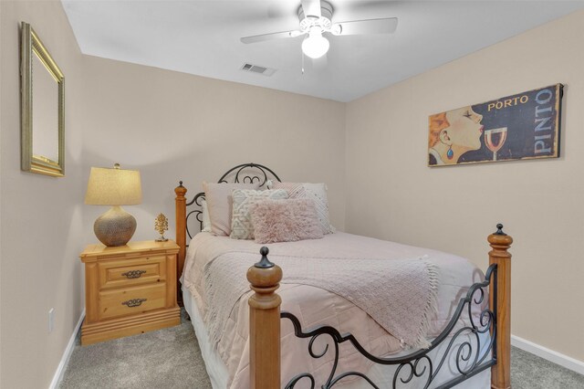 161 Cayman St, Point Blank, TX 77364 - carpeted bedroom with baseboards and a ceiling fan