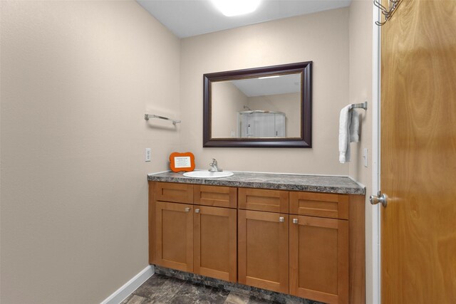 161 Cayman St, Point Blank, TX 77364 - bathroom with vanity and baseboards