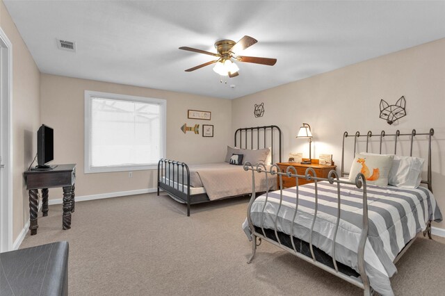 161 Cayman St, Point Blank, TX 77364 - carpeted bedroom featuring baseboards and a ceiling fan