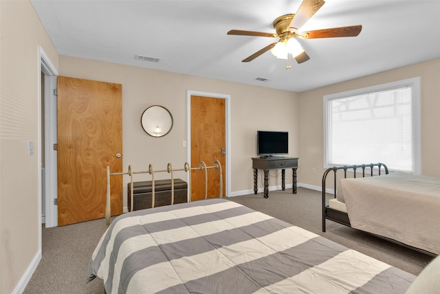 carpeted bedroom featuring ceiling fan