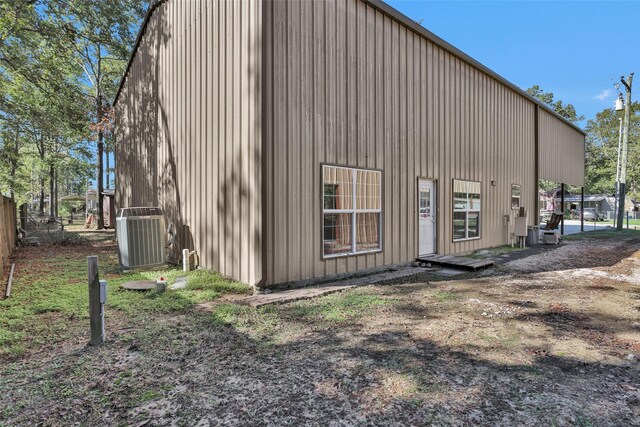 161 Cayman St, Point Blank, TX 77364 - back of property with central AC