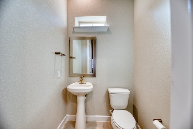 bathroom featuring toilet