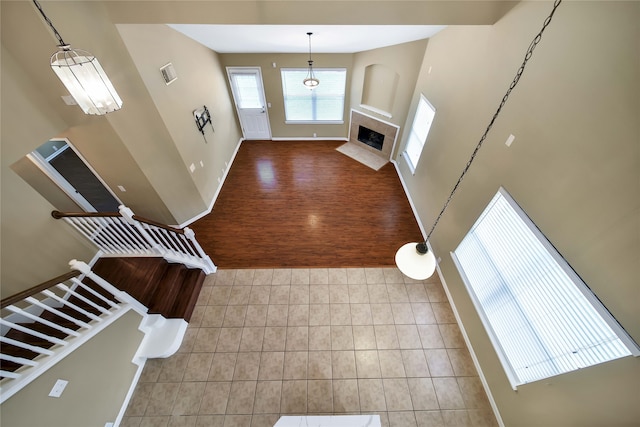 interior space with hardwood / wood-style flooring and an inviting chandelier