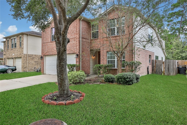 view of front of home featuring a front lawn and a garage