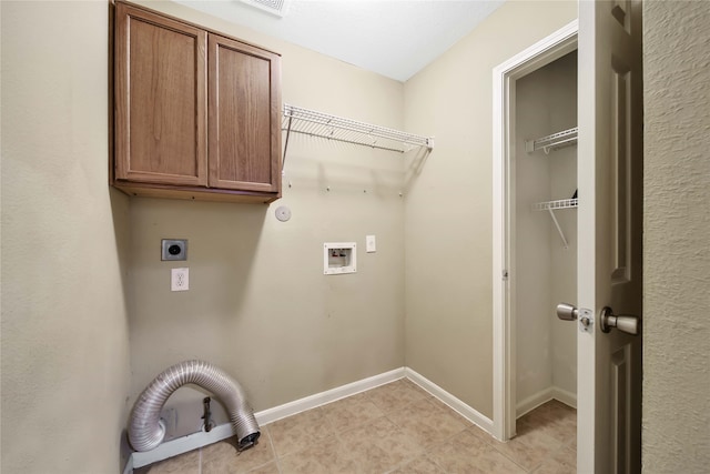 laundry area with cabinets, hookup for a washing machine, electric dryer hookup, and light tile patterned flooring