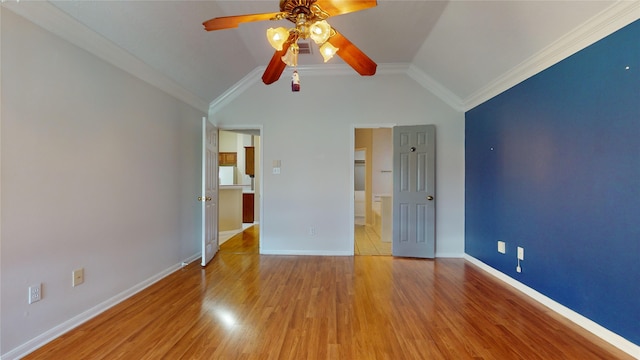 unfurnished bedroom with ornamental molding, ceiling fan, lofted ceiling, and light wood-type flooring